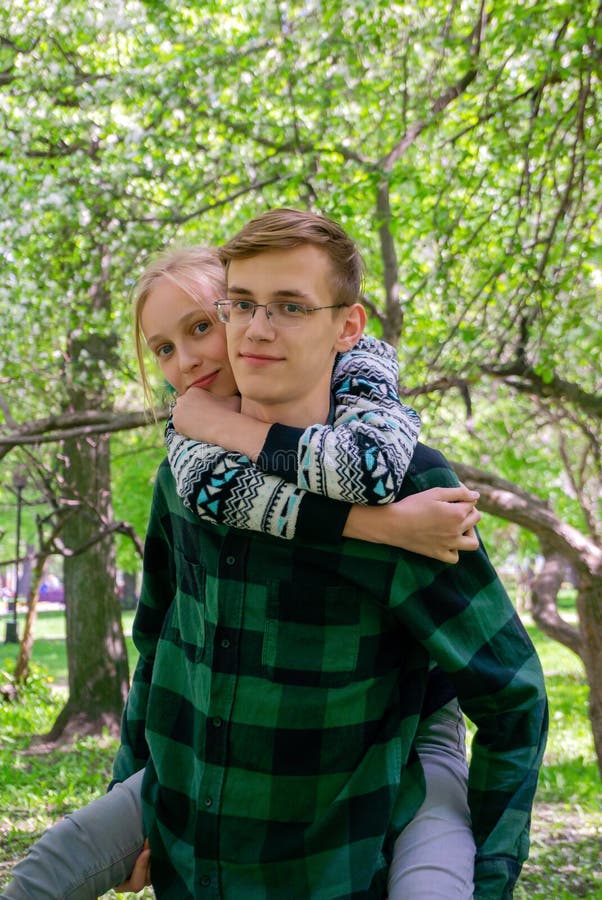 Happy teenagers in the park stock photos Happy teenagers in the park stock photos