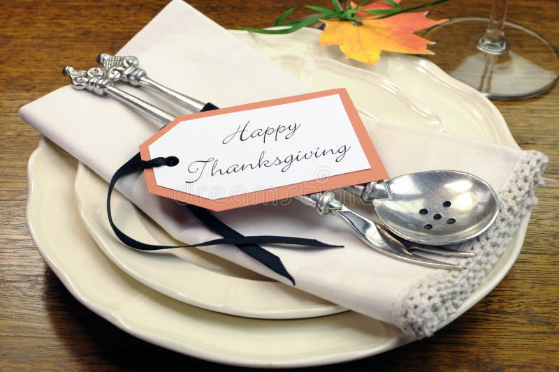 Happy Thanksgiving individual dinner table place setting stock photo Happy Thanksgiving individual dinner table place setting stock photo