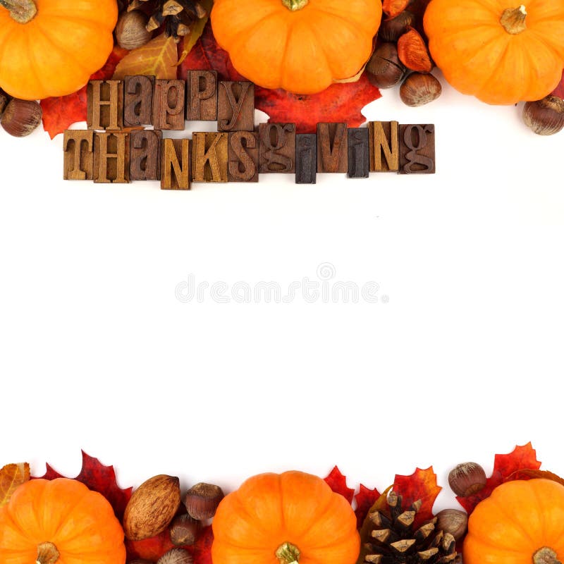 Happy Thanksgiving wooden letters with autumn double border over white stock images Happy Thanksgiving wooden letters with autumn double border over white stock images