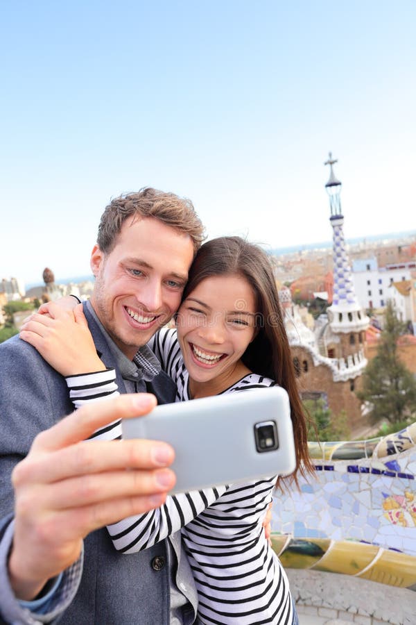 Happy travel couple selfie, Park Guell, Barcelona