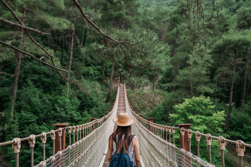 Happy travel woman on vacation concept. Funny traveler enjoy her trip and ready to adventure.