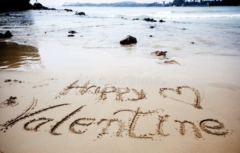 Happy Valentines day! written in sand