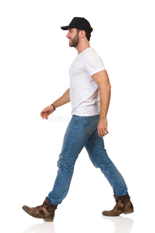 Happy Walking Man in White T-shirt, Jeans, Boots and Black Cap Stock Image  - Image of male, cheerful: 143189741