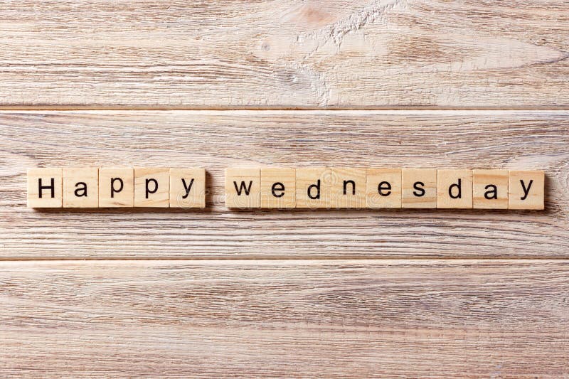 Happy Wednesday Word Written on Wood Block. Happy Wednesday Text on
