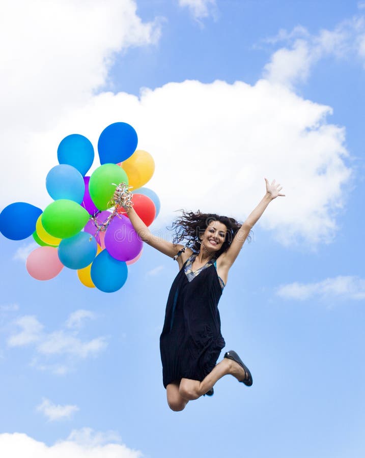 Happy woman with balloons