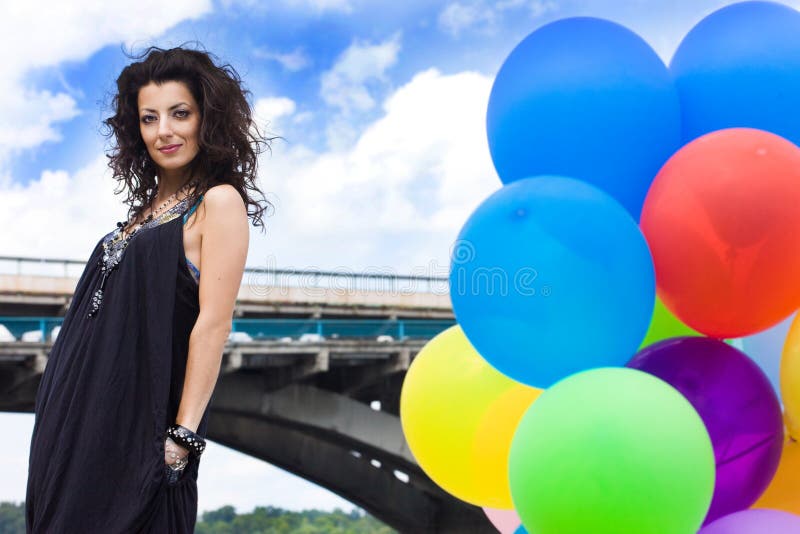 Happy woman with balloons