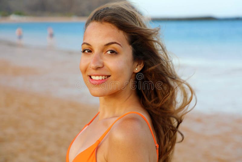 Happy Woman On The Beach Portrait Of Beautiful Girl With Wind