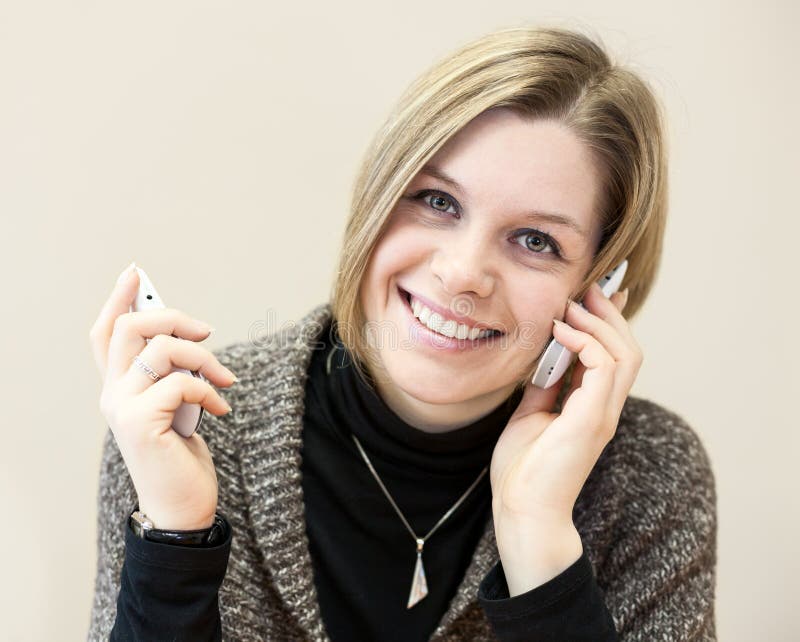 Happy Woman Calling with Two Mobile Phones Stock Image Image of