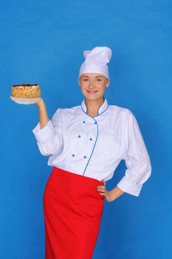 Happy woman- cook holding cake