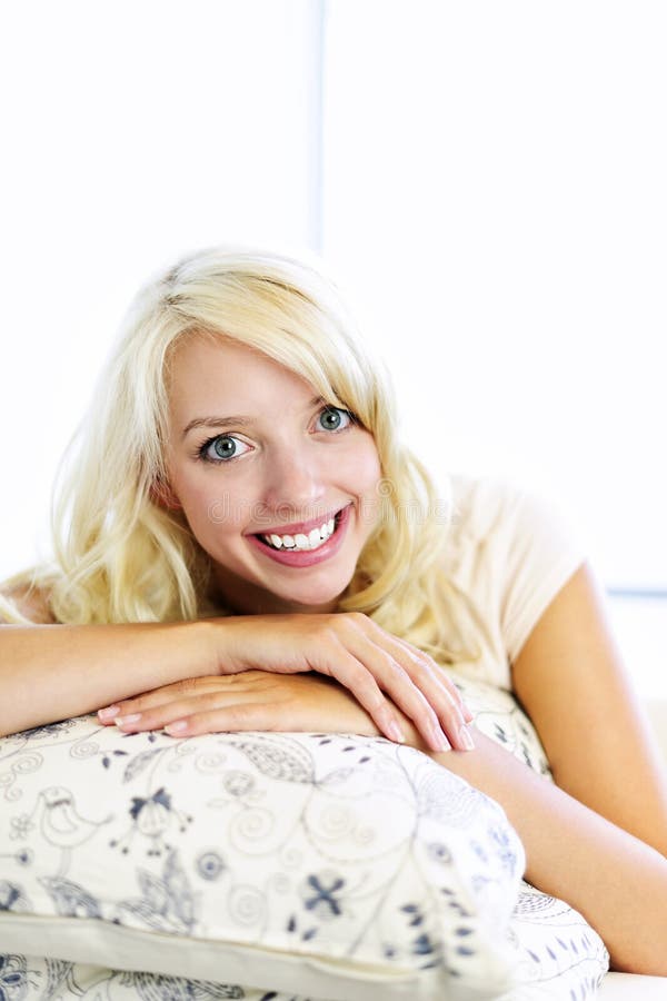 Happy woman on couch at home royalty free stock photo Happy woman on couch at home royalty free stock photo