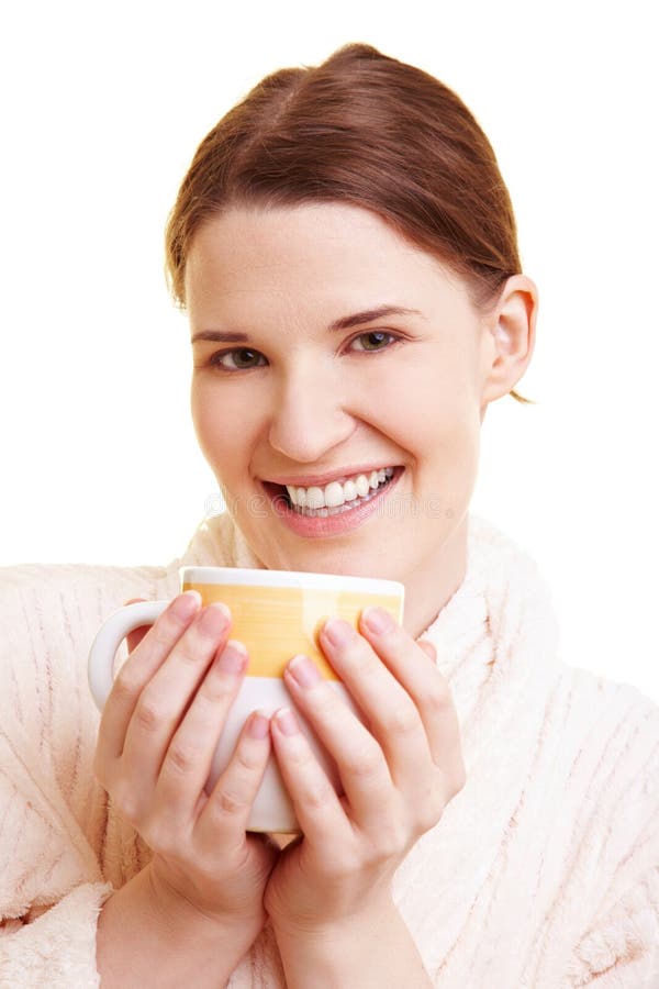 Happy woman drinking coffee royalty free stock image