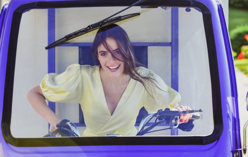 Happy Woman Driver in Funny Car Wheel. Stock Image Image of passenger