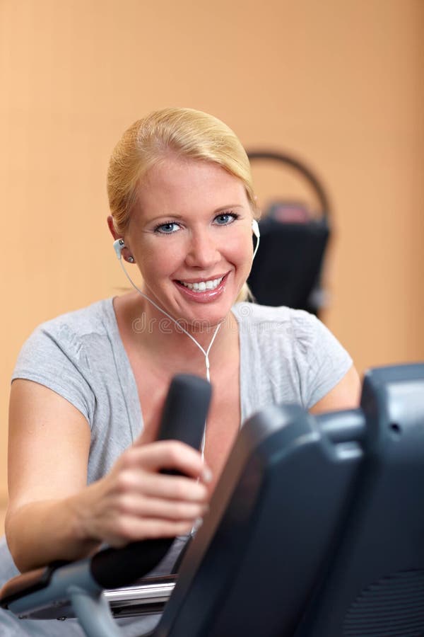 Happy woman exercising royalty free stock images
