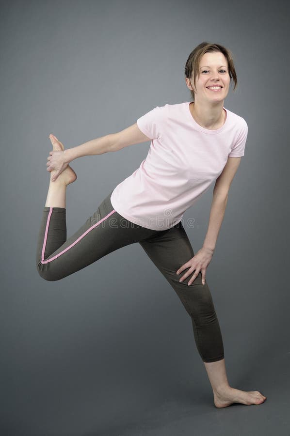 Happy woman exercising aerobics