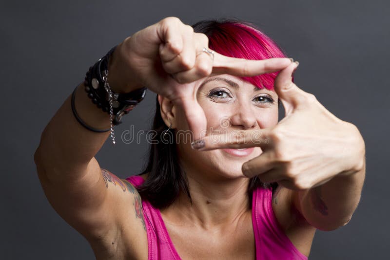 Happy woman framing face stock photo