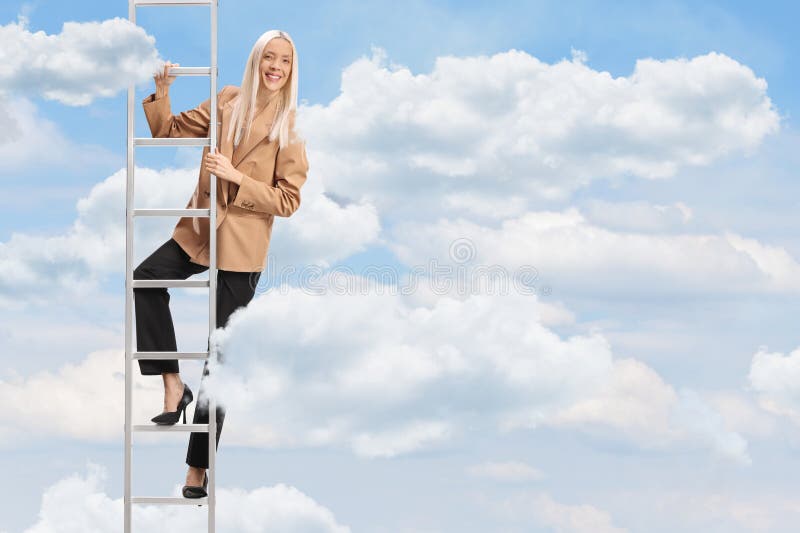 Happy woman in high heels standing on a ladder royalty free stock images