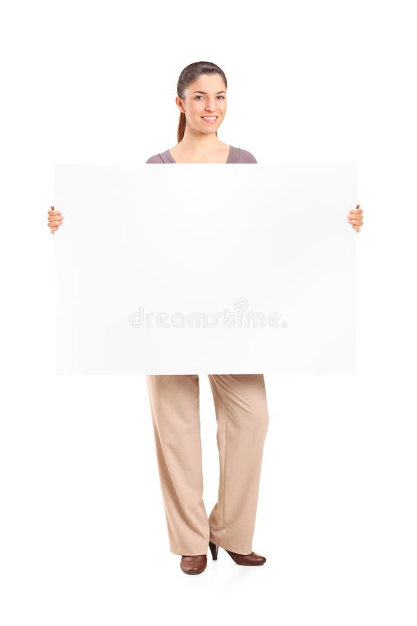 Happy woman holding a blank billboard royalty free stock photography