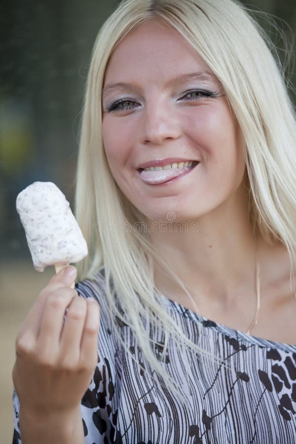 Happy woman with ice cream