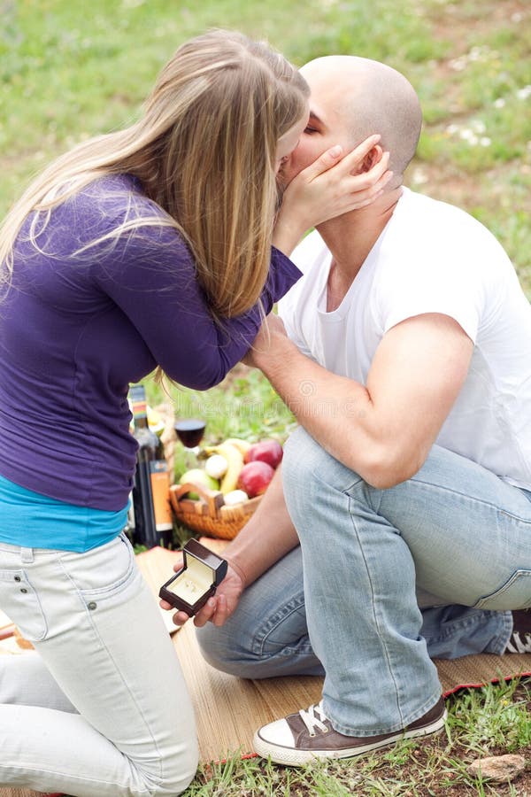 Happy woman kissing her boyfriend