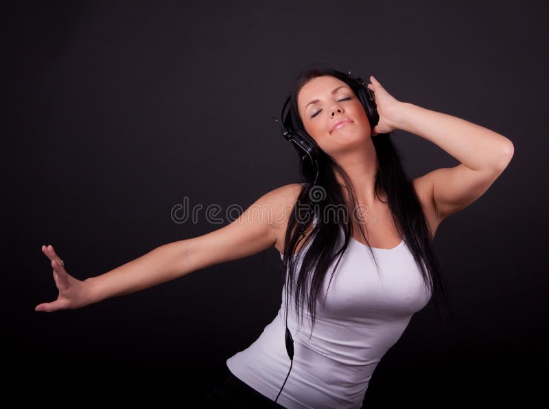 Happy woman listening music