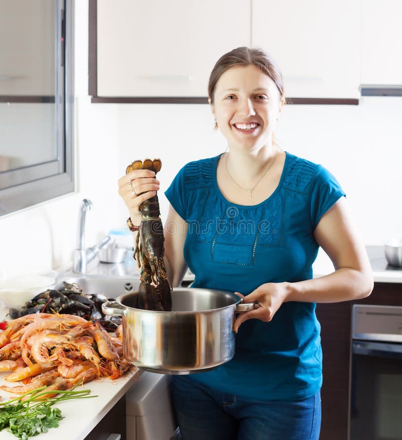 Happy woman with lobster stock image. Image of ingredient 30917085