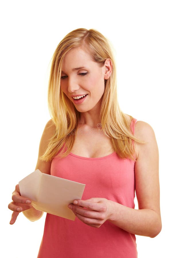 Happy woman opening letter royalty free stock photography