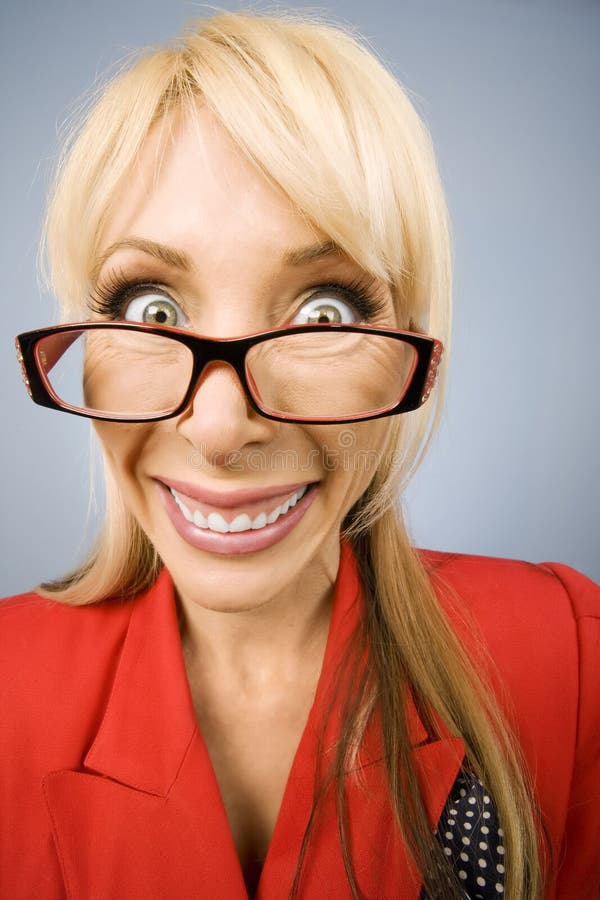 Happy woman in red with a big smile