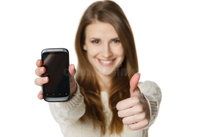 Happy woman showing her mobile phone and gesturing thumb up