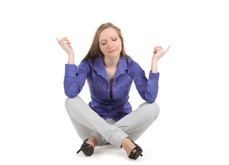 Happy woman sitting against white background