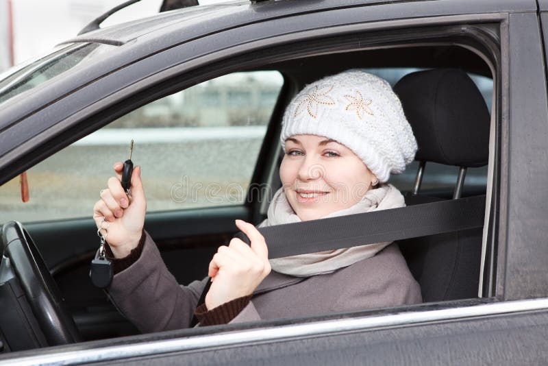 Happy woman sitting in car stock photos Happy woman sitting in car stock photos