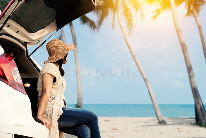 Happy woman sitting in the car and traveling summer season royalty free stock photos Happy woman sitting in the car and traveling summer season royalty free stock photos