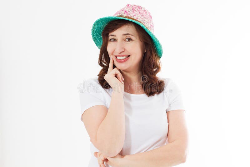 Happy woman in summer hat isolated on white background. Sun protection skin care and vacation holidays concept. Middle age female royalty free stock photography Happy woman in summer hat isolated on white background. Sun protection skin care and vacation holidays concept. Middle age female royalty free stock photography