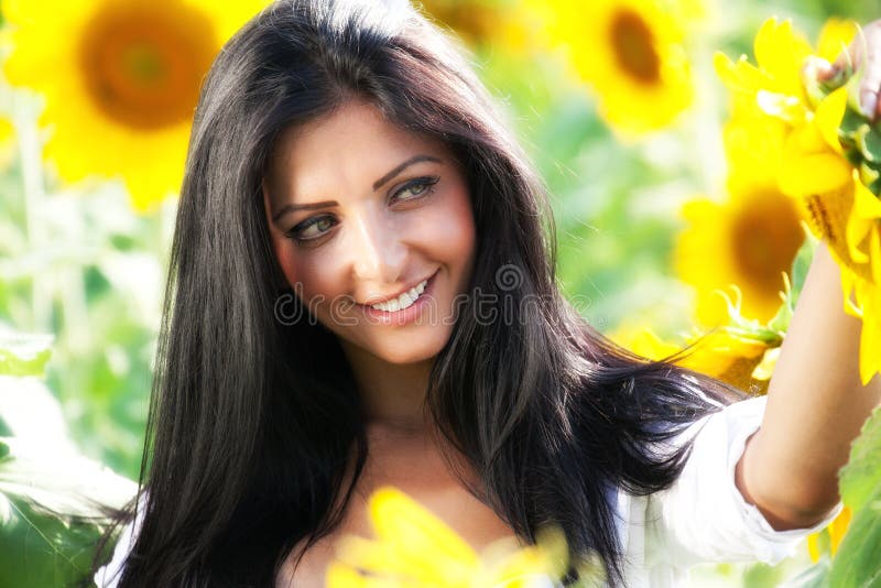 Happy woman in sunflower field royalty free stock photos Happy woman in sunflower field royalty free stock photos