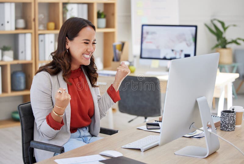 Happy woman winning on computer in success, bonus or celebration for news, sales and business cheers in office. Yes of