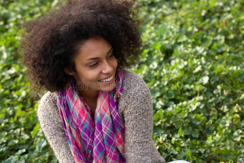 Happy young african american woman smiling