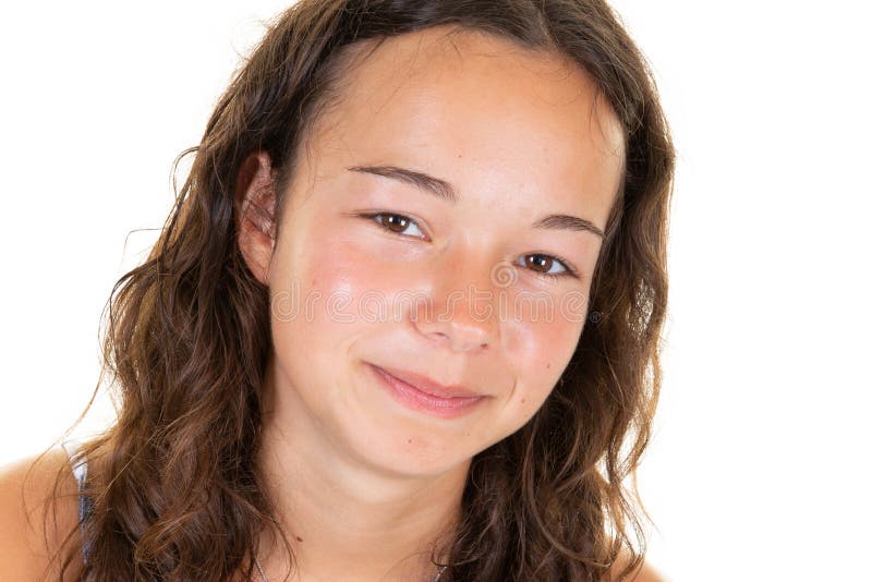 Happy young beautiful girl teenager posing and looking to the camera in closeup stock photos Happy young beautiful girl teenager posing and looking to the camera in closeup stock photos