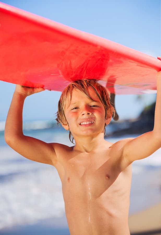 Happy young boy at the beach