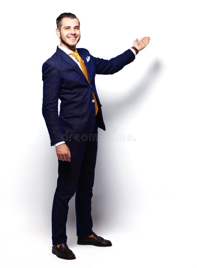 Happy Young Businessman Presenting Isolated Over White stock photography Happy Young Businessman Presenting Isolated Over White stock photography