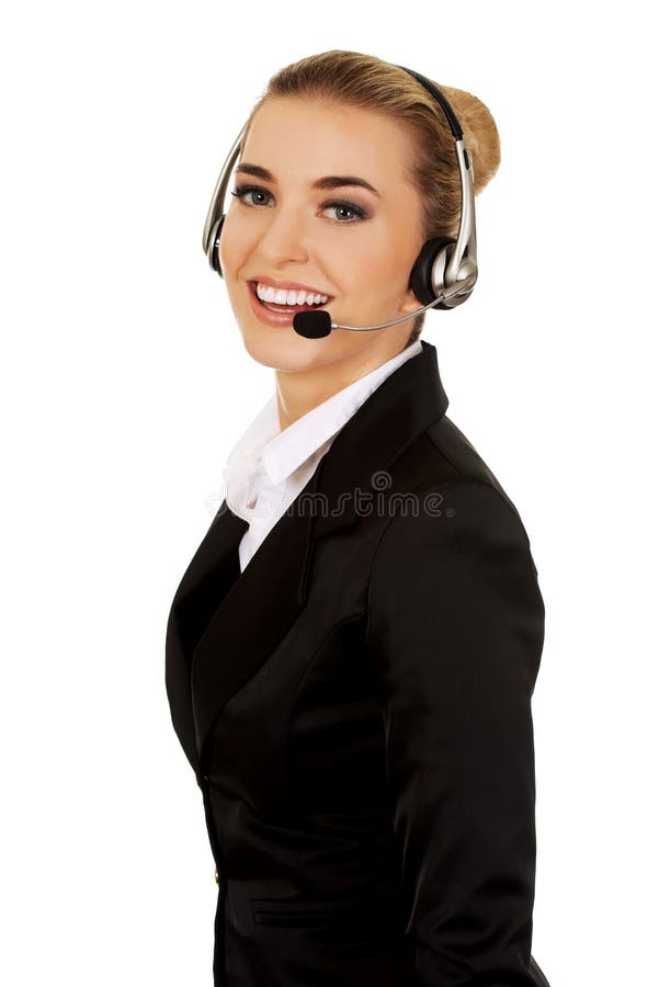 Happy young businesswoman with headset.