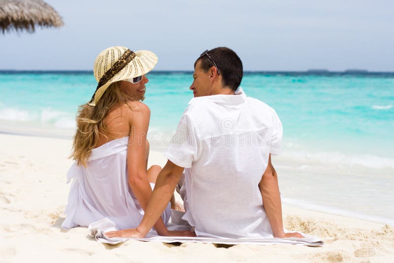 A happy young couple on a beach