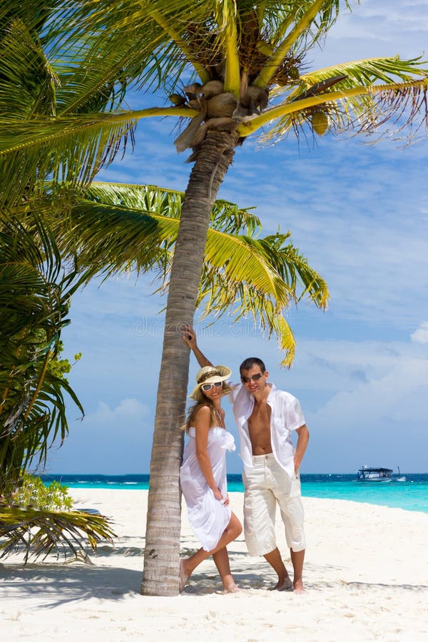 Happy young couple on a beach