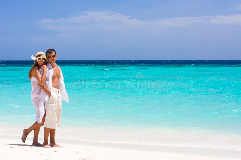 Happy young couple on a beach