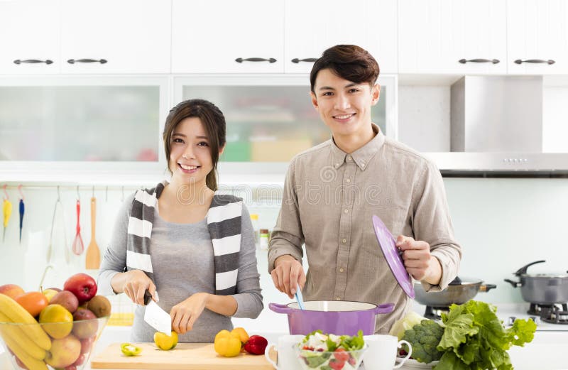 Young Couple cooking in the kitchen