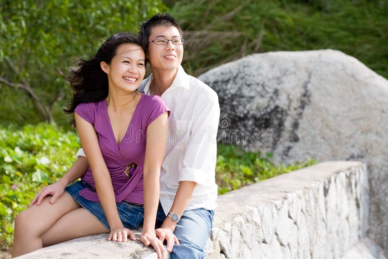 Happy young couple enjoying the scenery