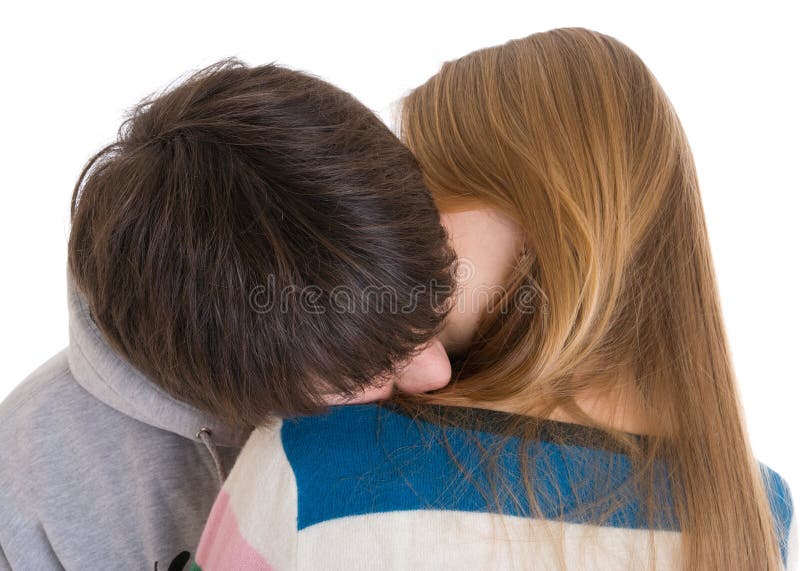 The happy young couple isolated on a white