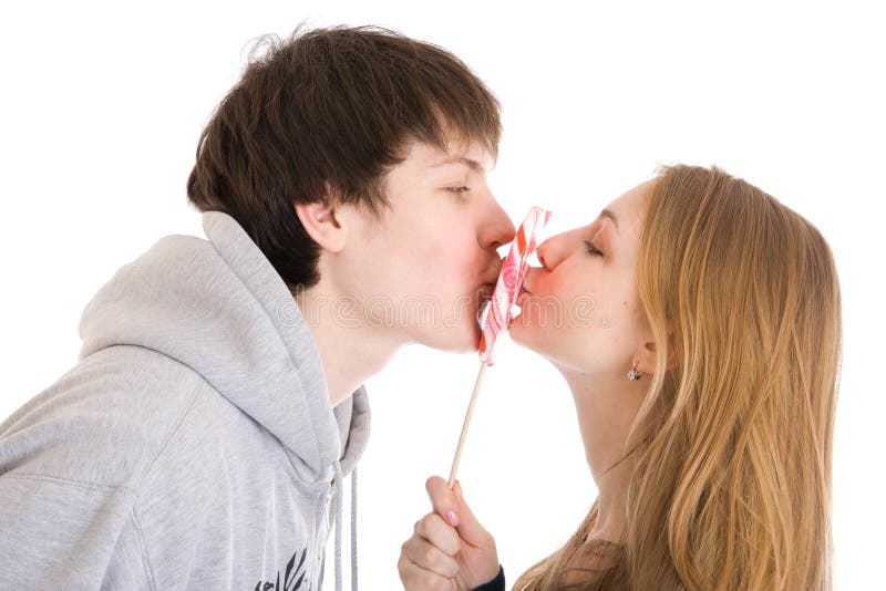 The happy young couple isolated on a white