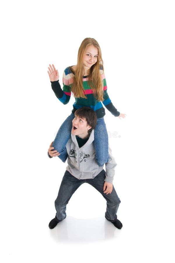 The happy young couple isolated on a white