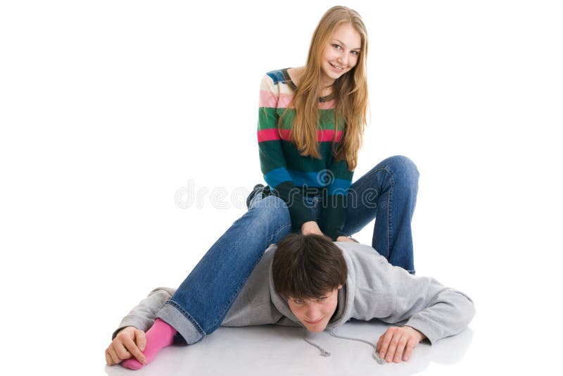 The happy young couple isolated on a white