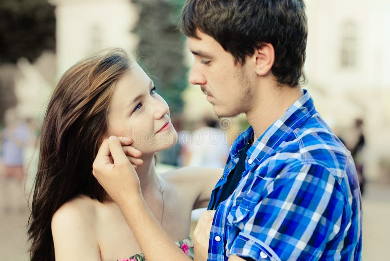 Happy young couple in love in city