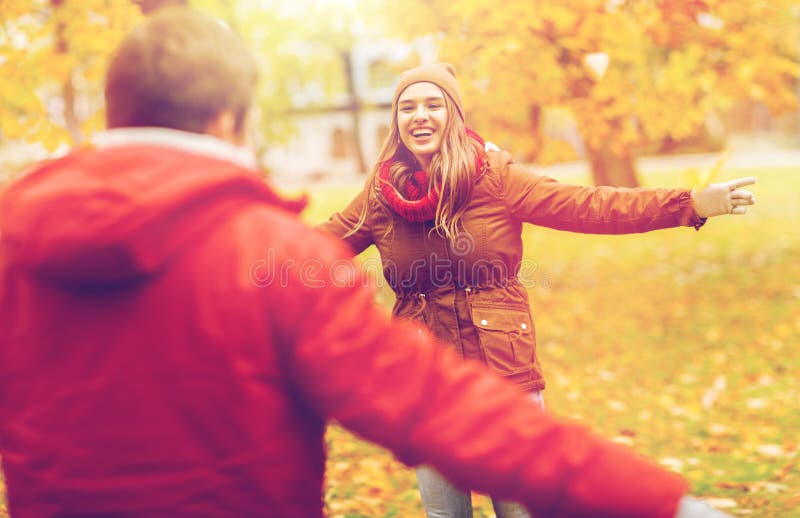Happy Young Couple Meeting in Autumn Park Stock Photo - Image of girl ...